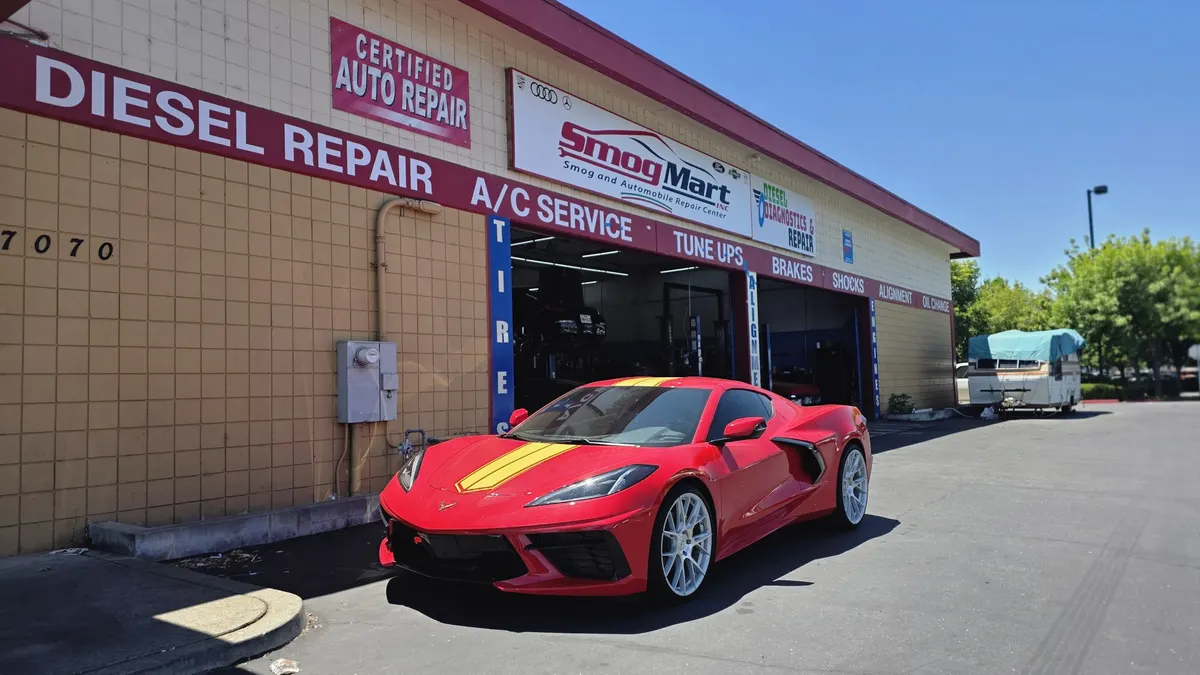 Corvette in front of Smog Mart on Stockton Blvd