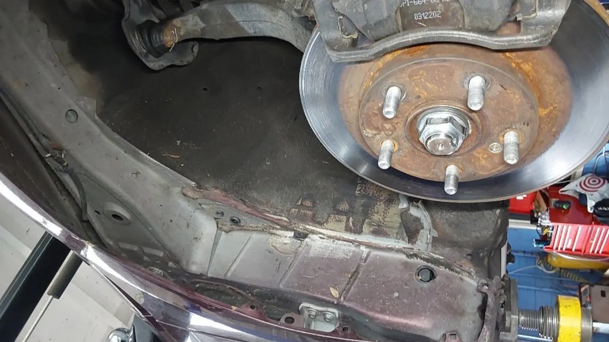 Brake rotor and hub during a VSSI inspection at Smog Mart