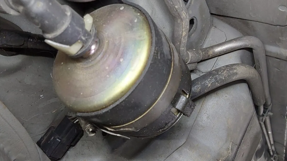 Under-hood work at Smog Mart in Sacramento