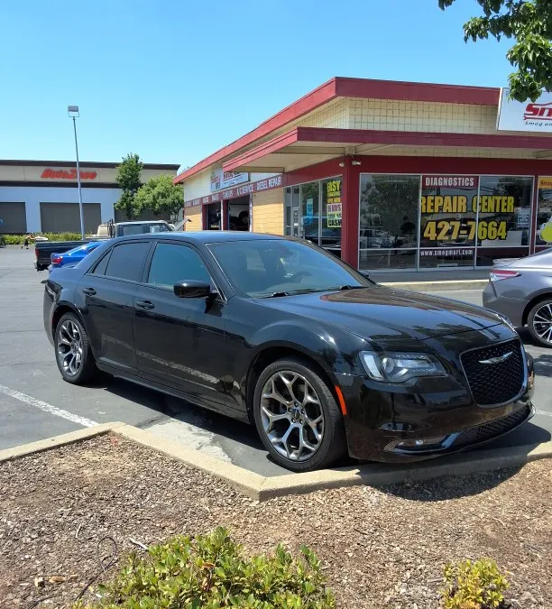 Sedan at Smog Mart on Stockton Blvd, Sacramento